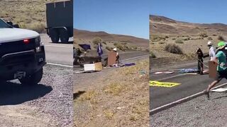 Ranger plows through protesters blocking a road