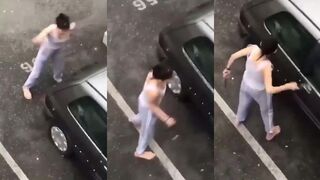 Guy SWEEPS THE LEG of woman destroying car with hammer