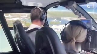 Two helicopters collide in mid air