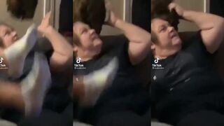 woman's wig ripped off, she is sooooo mad