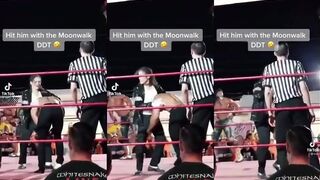 Wrestler dressed like Michael Jackson performs the Moonwalk DDT