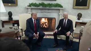 Joe Biden is all smiles sitting next to Trump